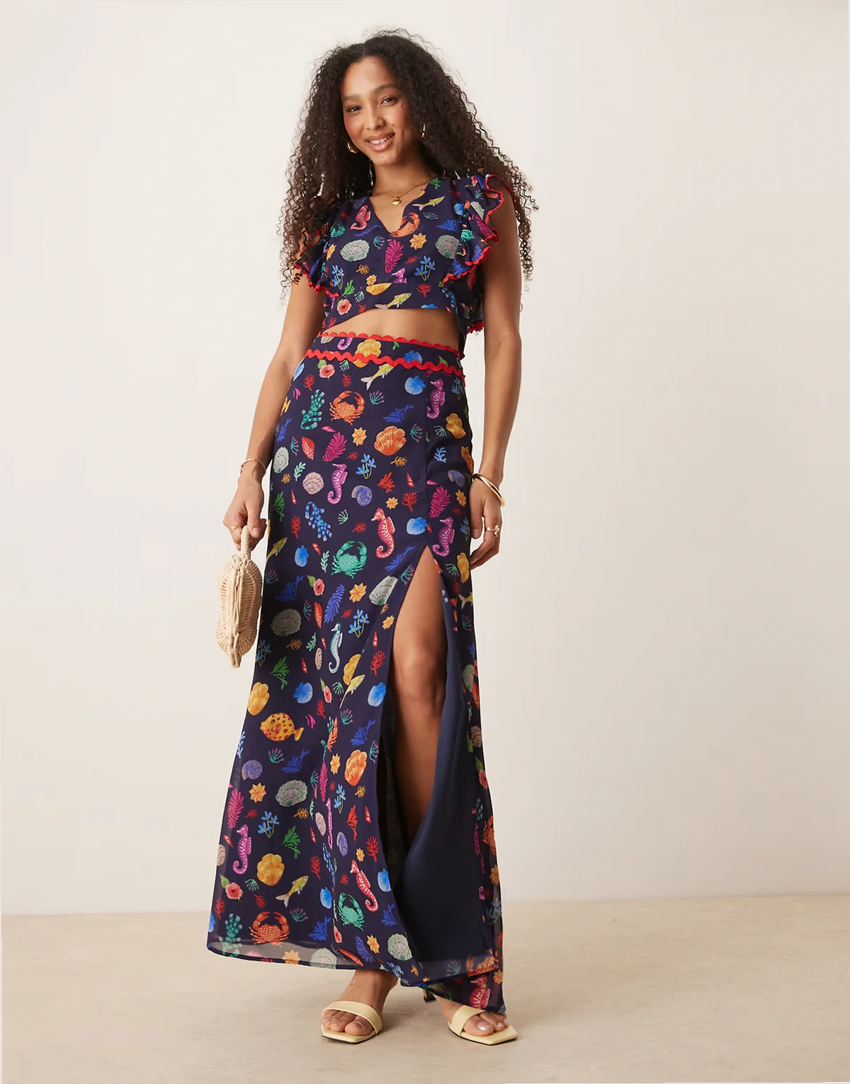 high waisted thigh slit maxi skirt in navy shell print - part of a set