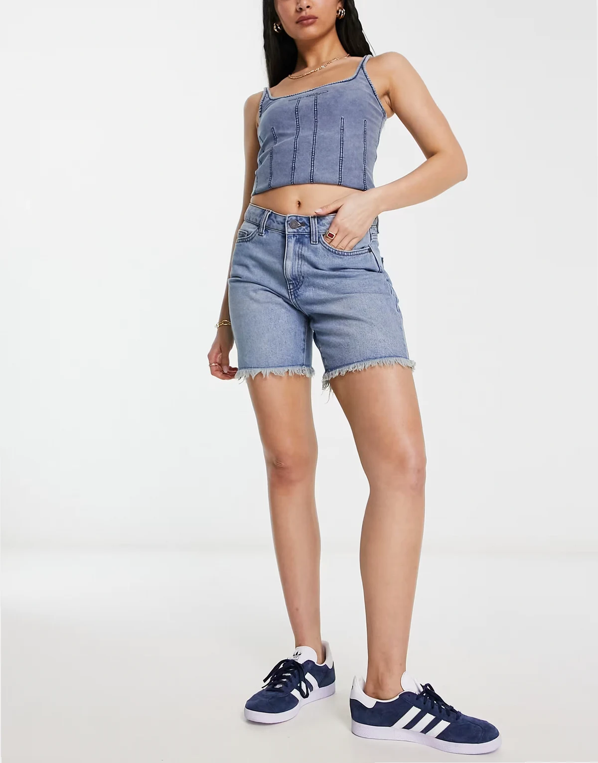 frayed hem longline denim shorts in light blue denim