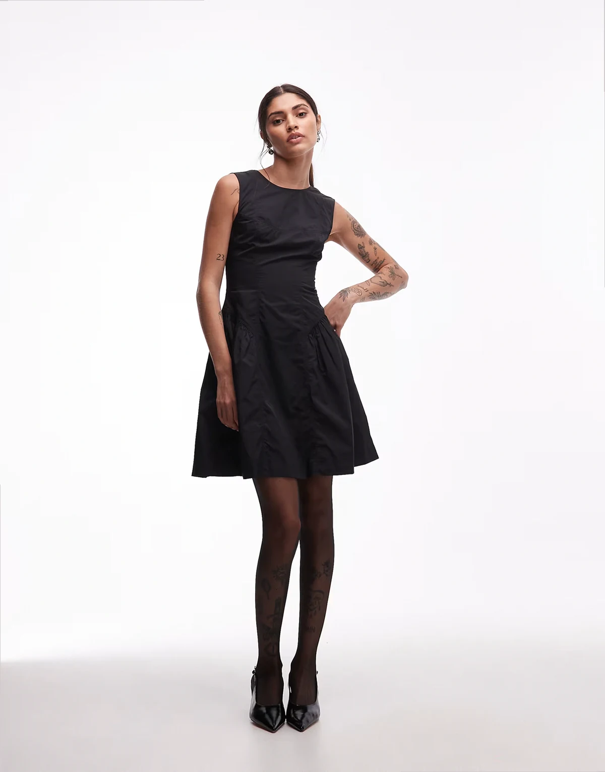 drop waist nylon mini dress with cinched waist in black