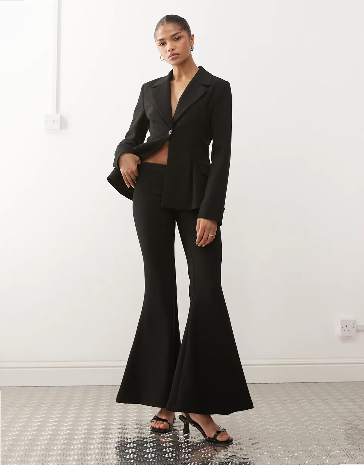 exaggerated flare pants suit in black - part of a set