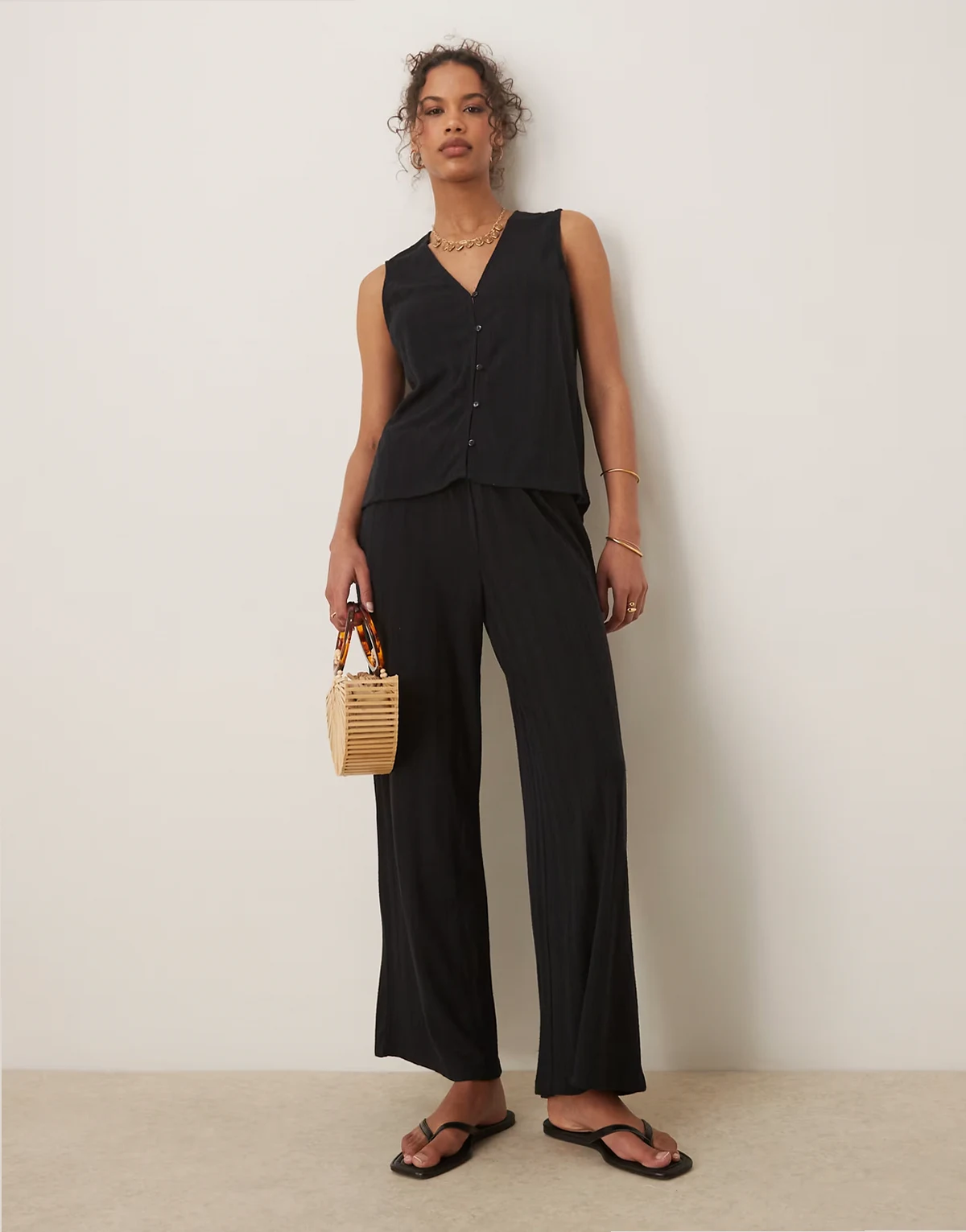 lightweight knit wide leg pants in black - part of a set
