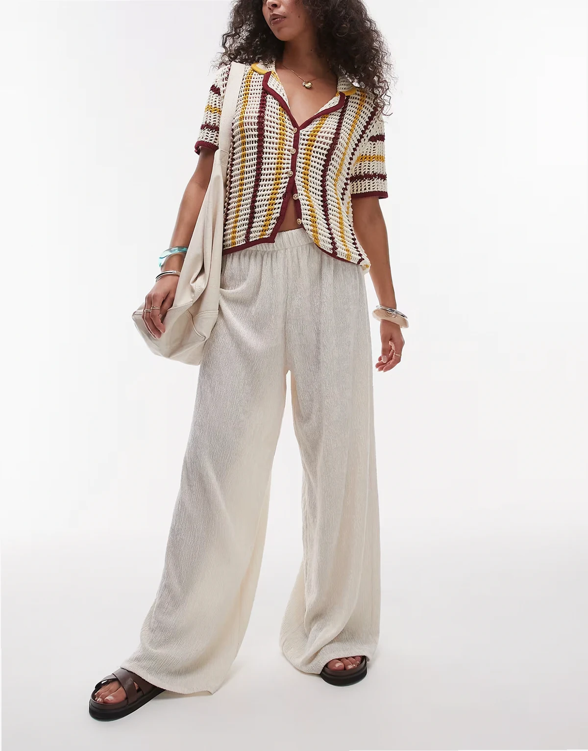 – Hose in Steinbeige mit weitem Bein und Strukturmuster