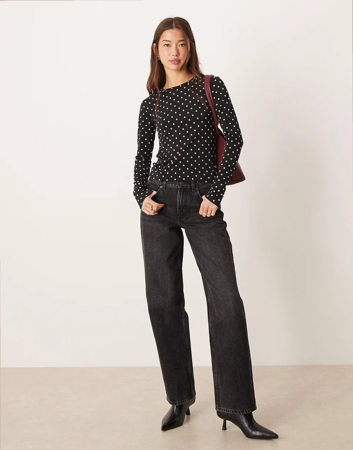 – Langärmliges Oberteil in Schwarz mit Polka Dots