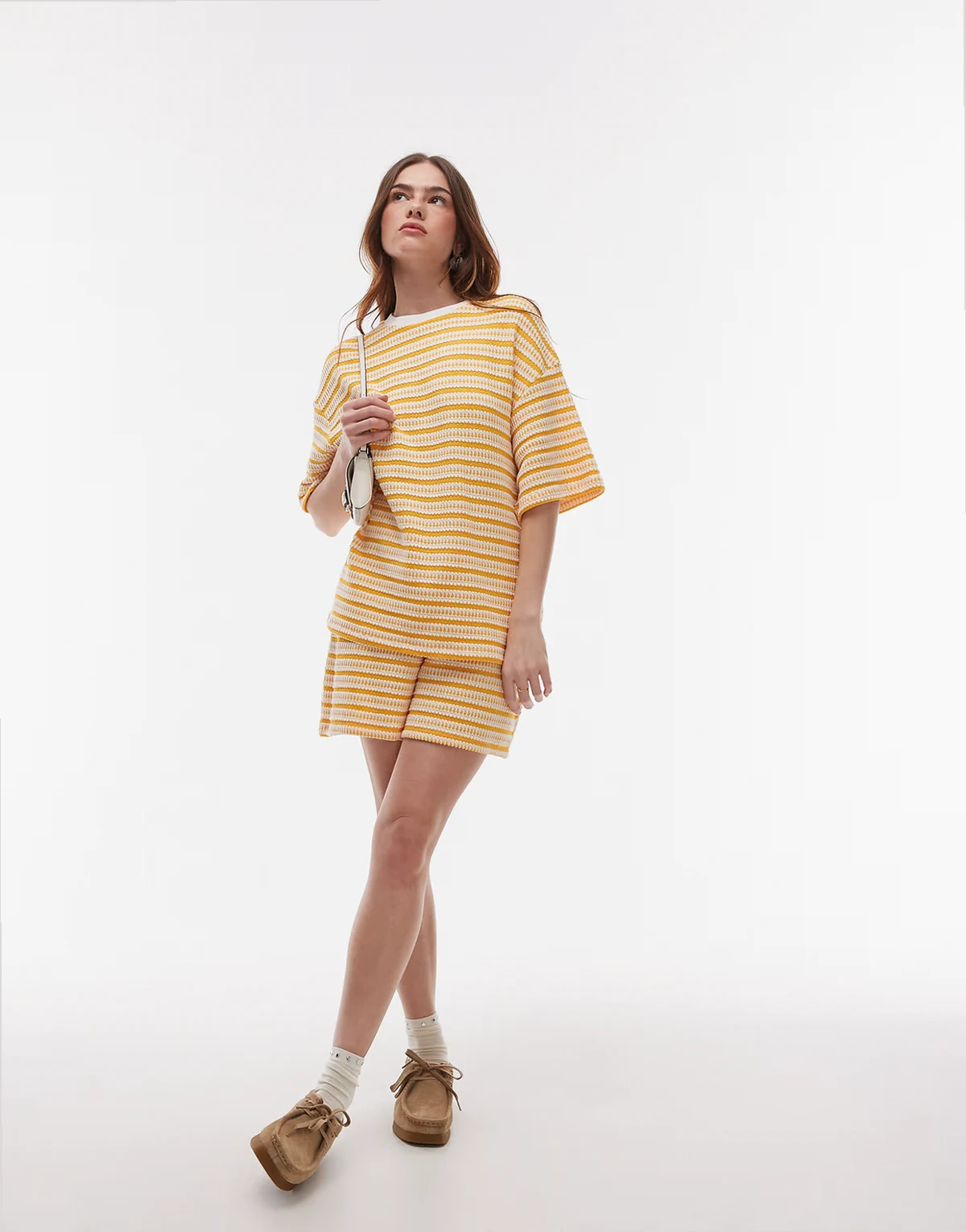textured striped shorts in orange - part of a set