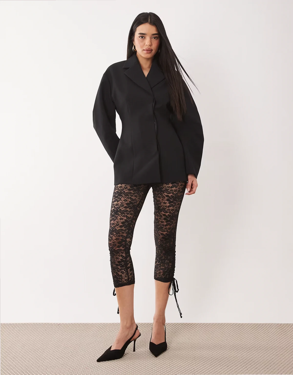 – Leggings aus Spitze in Schwarz mit Schleifendetail