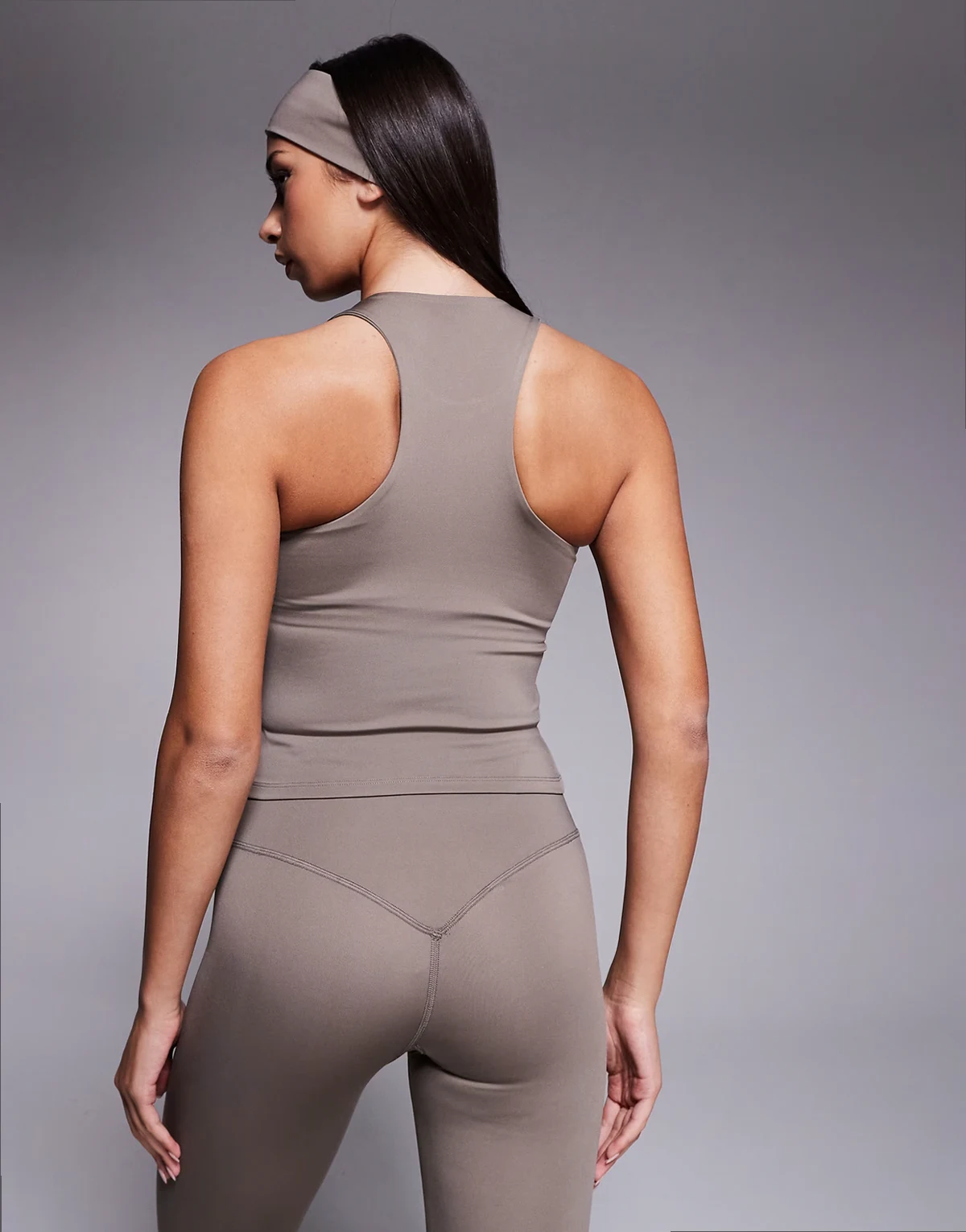 Icon active racer back tank top with inner bra and removable padding in morel