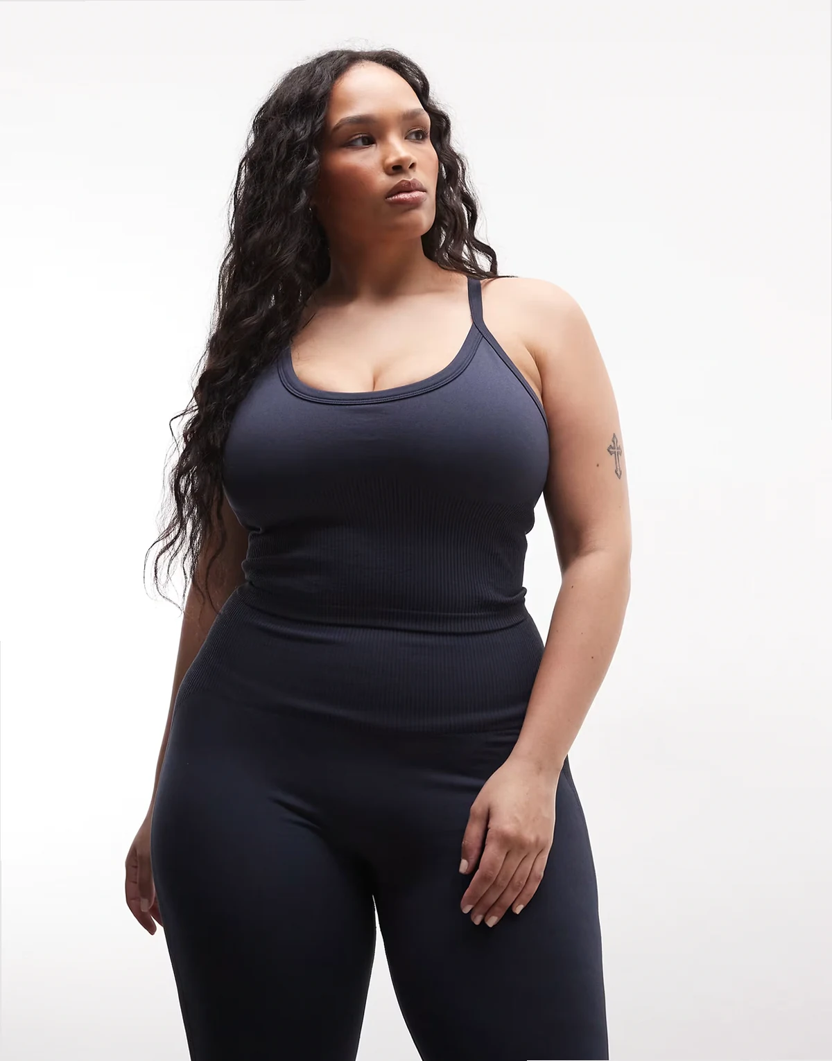 Curve sculpting seamless tank top with shelf bra and adjustable straps in indigo