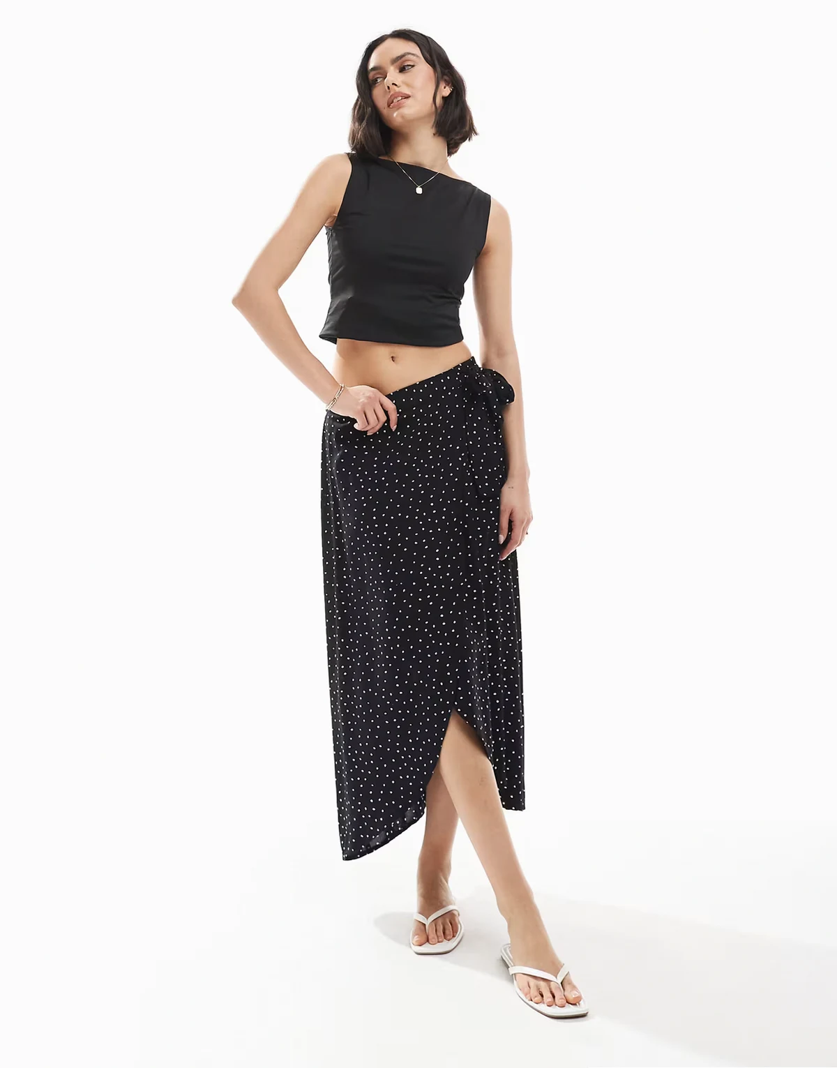 wrap midi skirt in black spot print