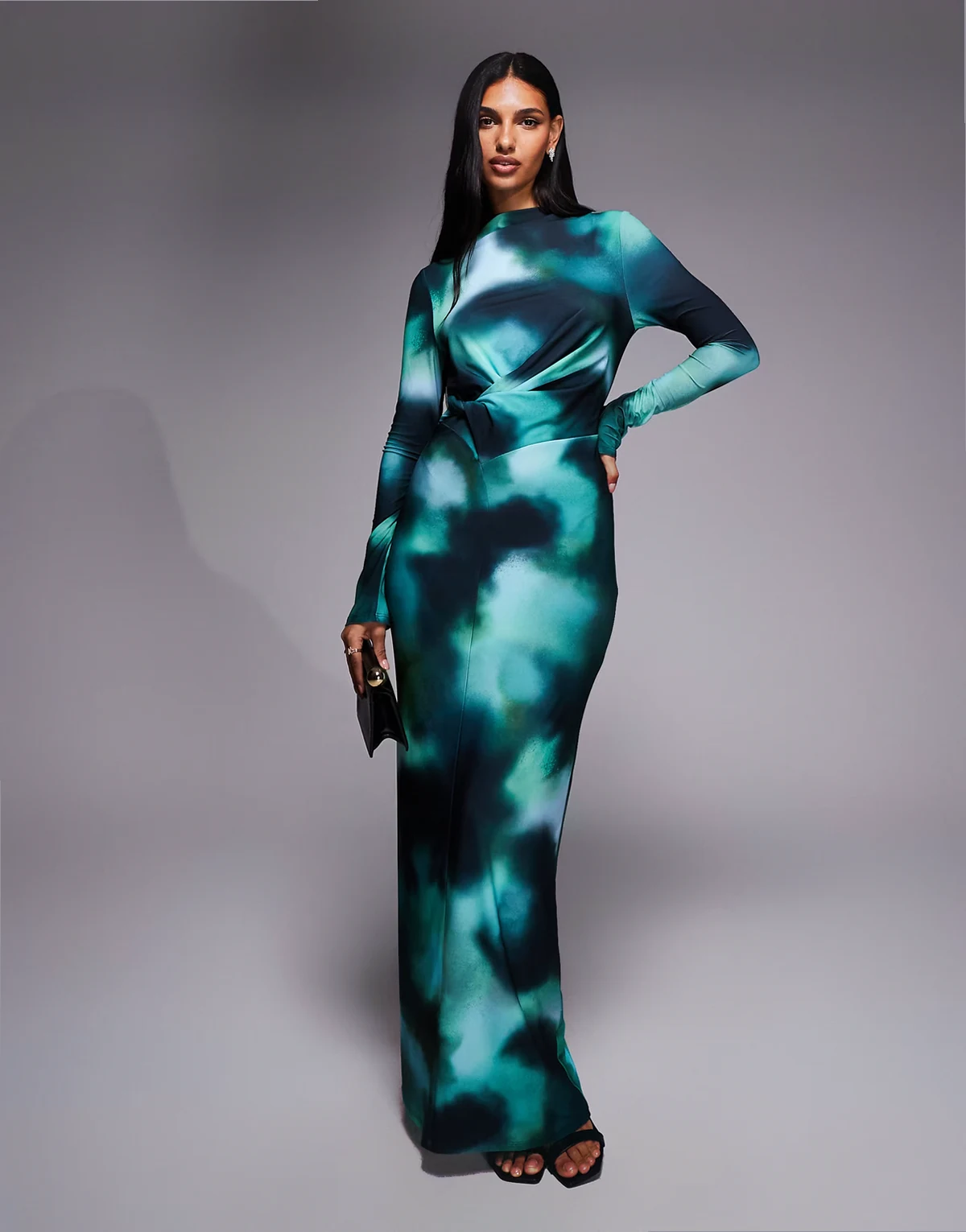 draped maxi dress with twisted detailing in teal abstract print