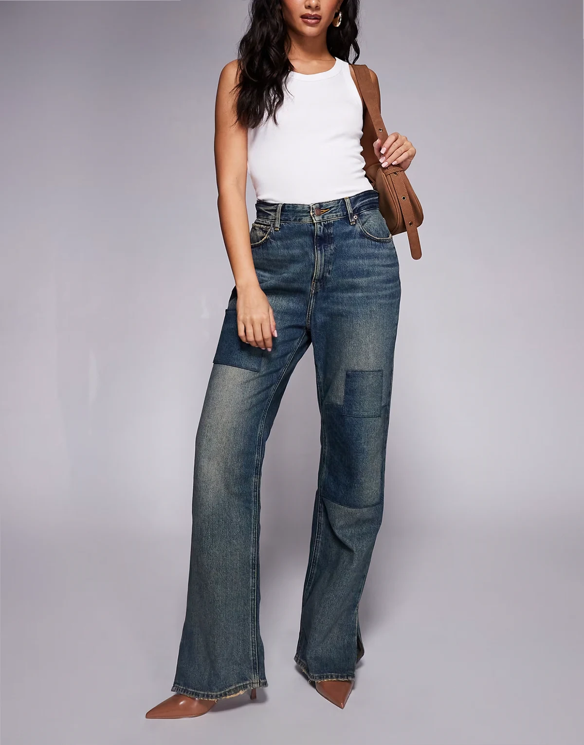 The Khloé patchwork split hem jeans in vintage wash
