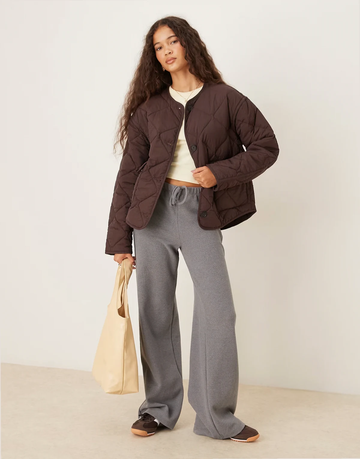 – Steppjacke in Braun mit Pattentaschen vorne