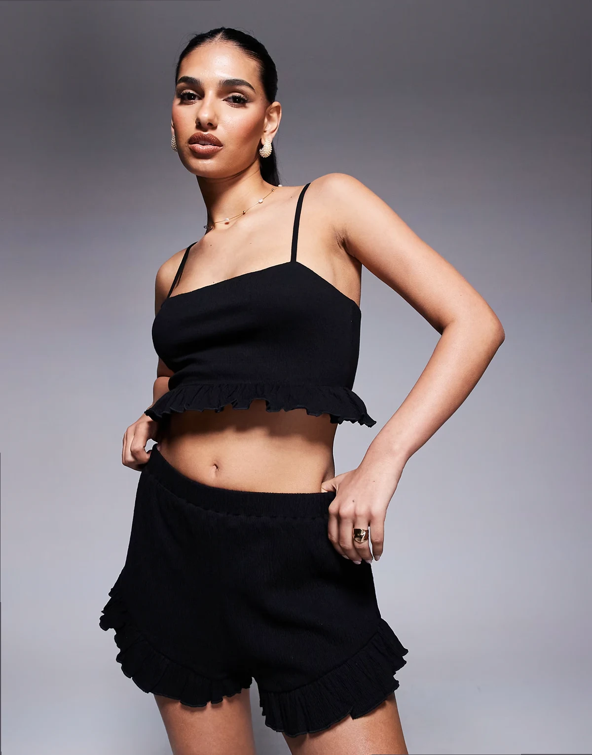 crinkle flippy shorts with frill hem in black - part of a set