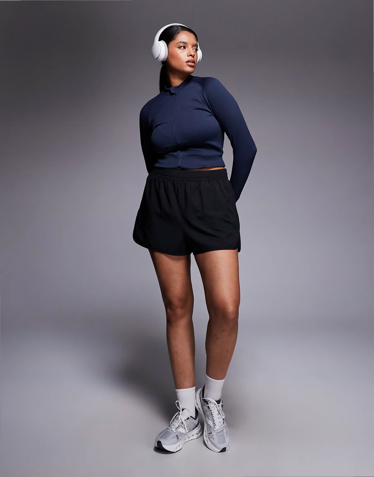Curve Icon woven running shorts with zip pockets in black