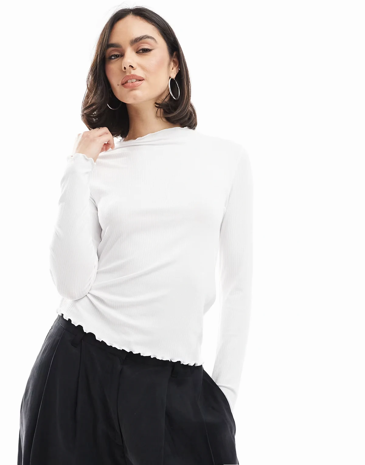 ribbed long sleeve top with lettuce edge detail in white