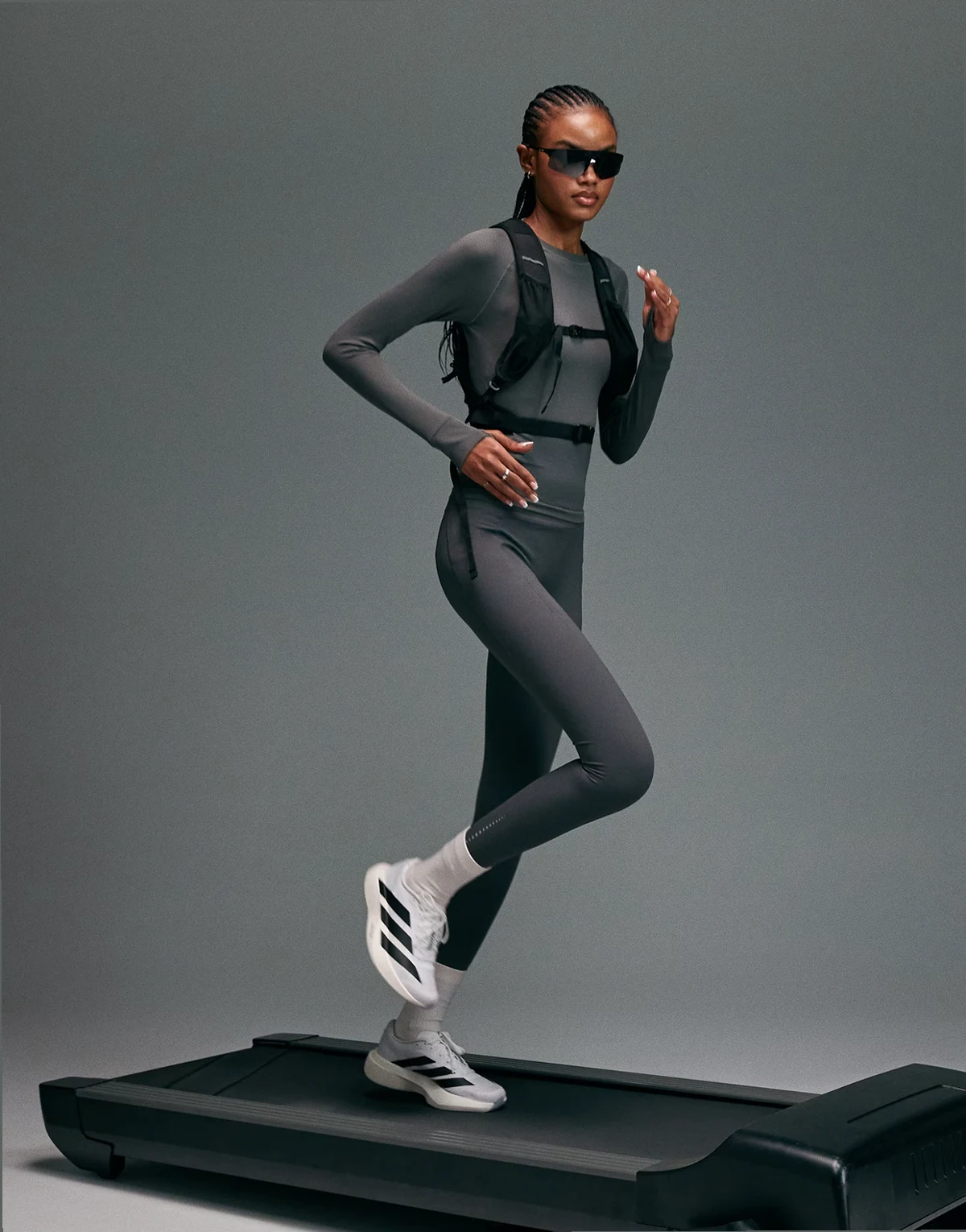 Premium reflective high waist running leggings with phone pockets and bonded seams in turbulence gray