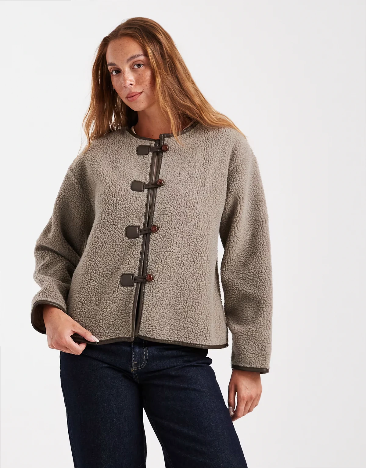 teddy collarless jacket with toggle closures in taupe