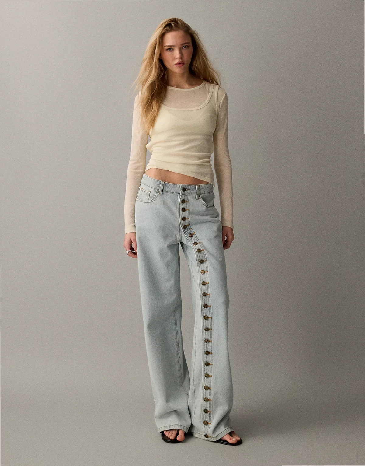 Penny asymmetric button detail relaxed leg jeans in light wash