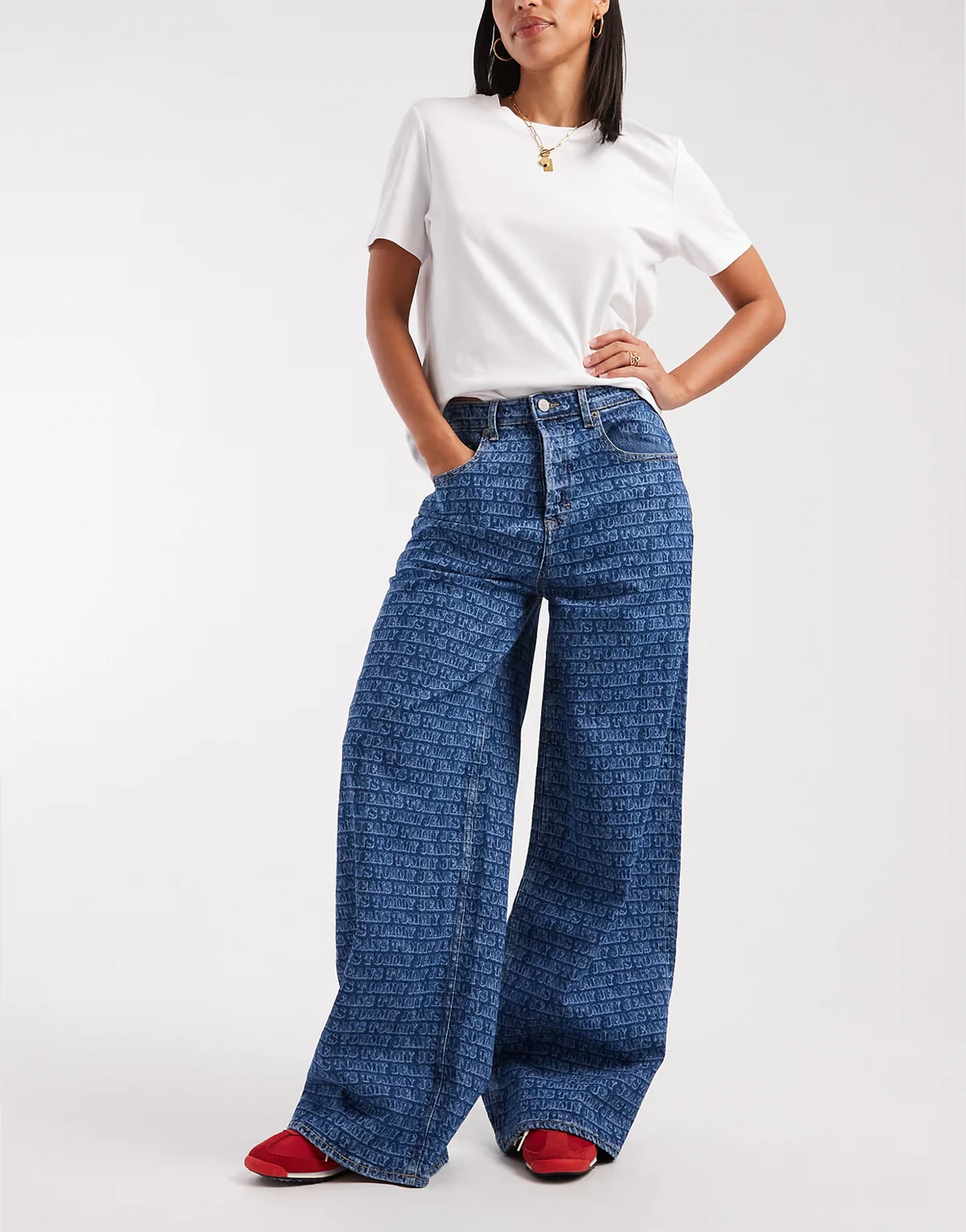 Charlie loose jeans with all over logo print in mid wash
