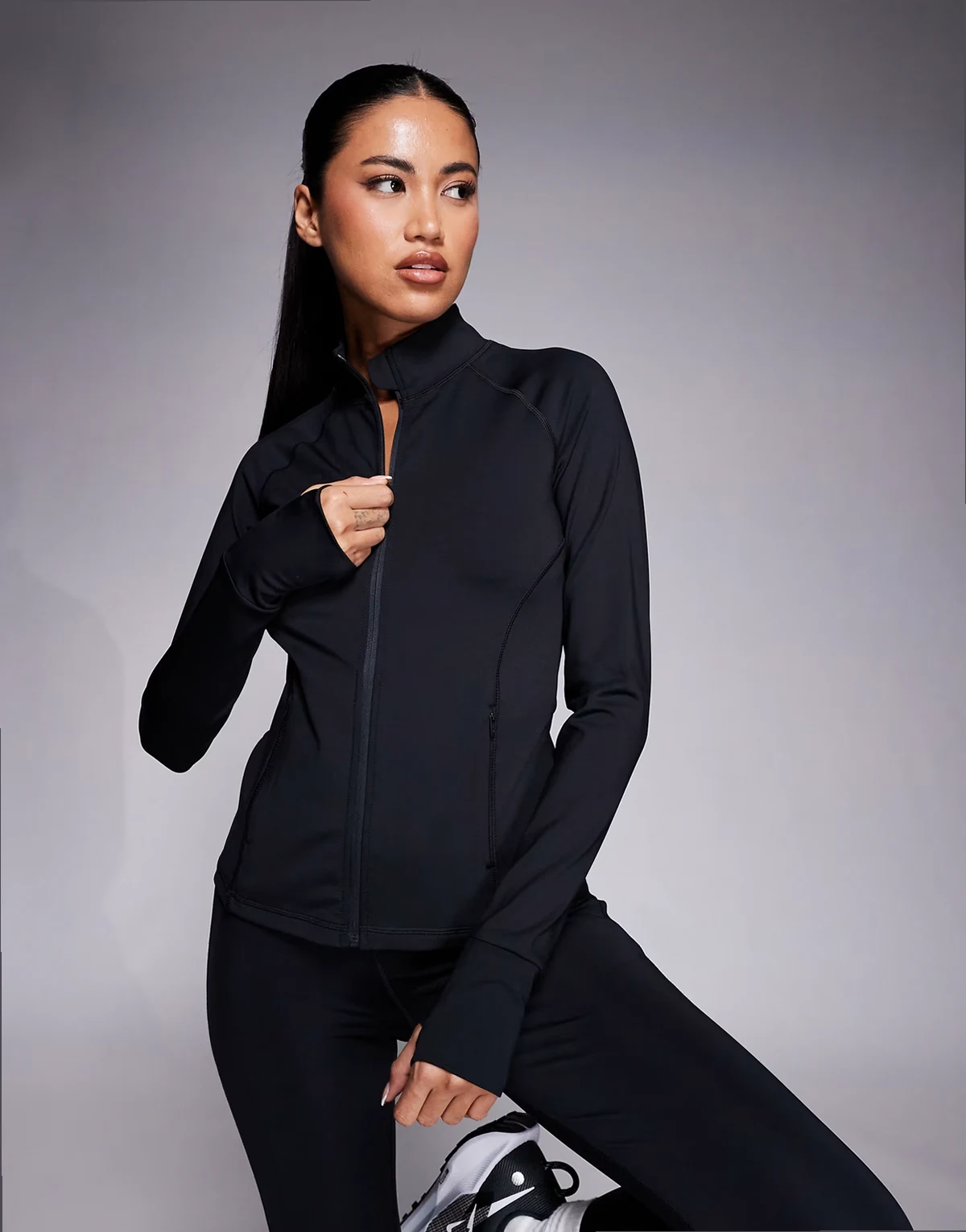 Icon sculpting zip up long sleeve jacket in black