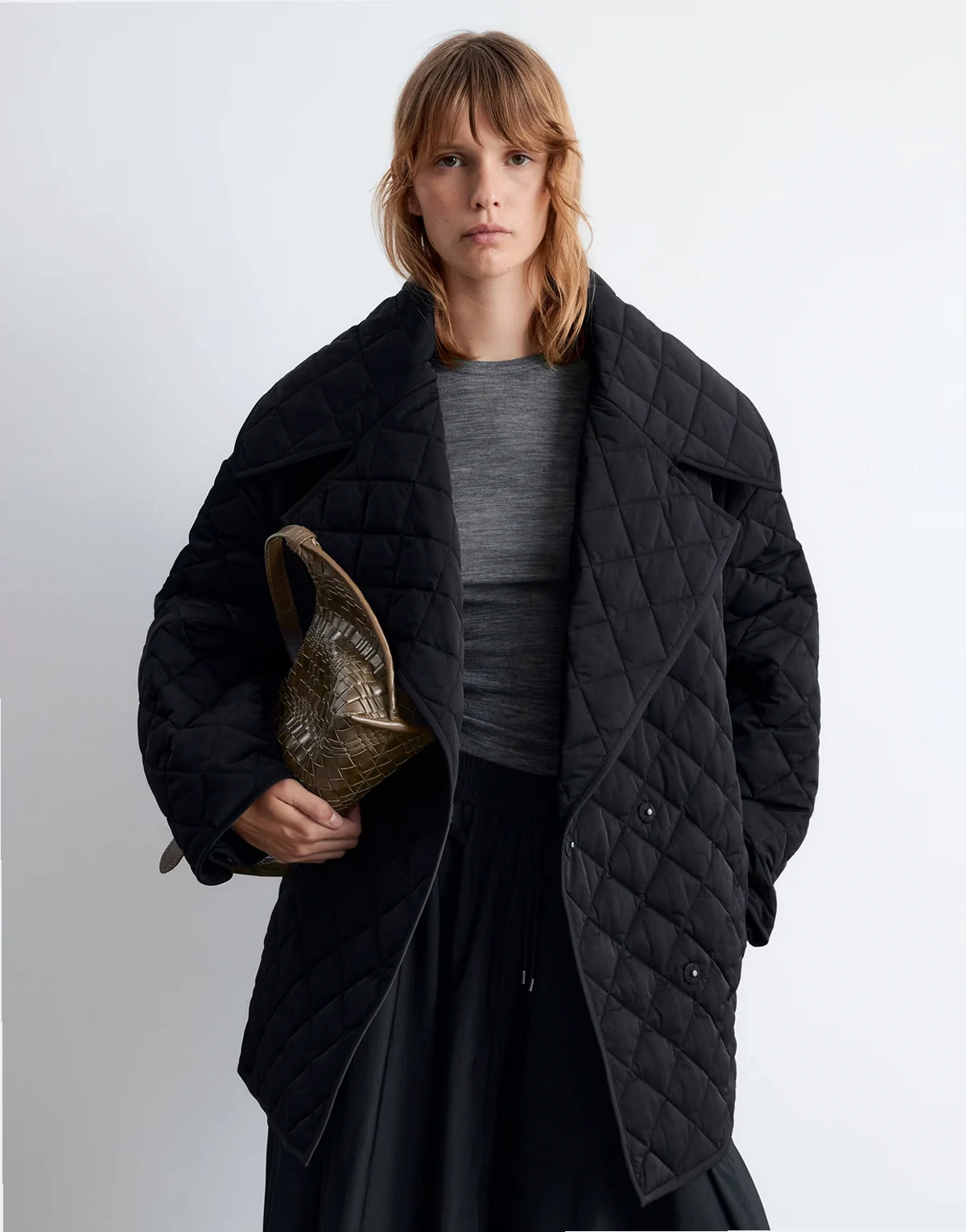 quilted belted longline jacket in black