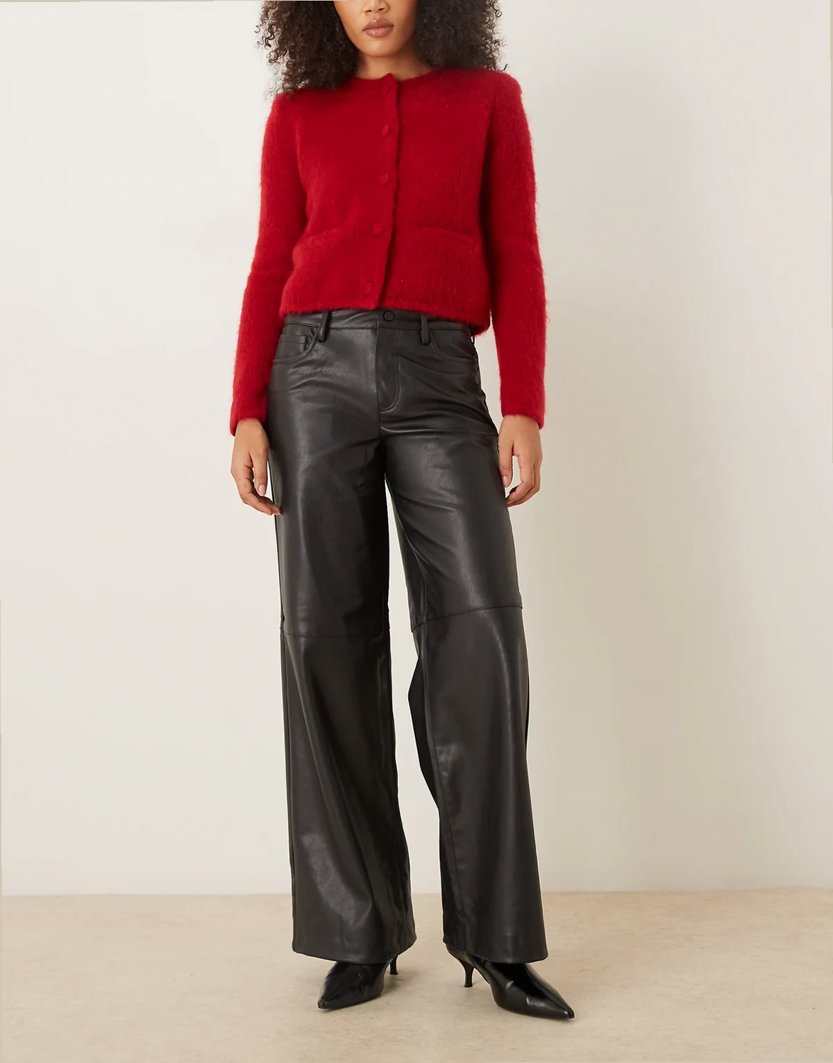wide leg faux leather pants with seam details in black