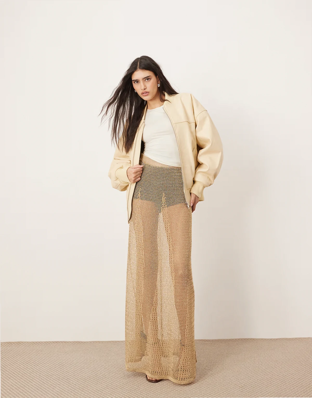 metallic knitted sheer sweeping maxi skirt in gold
