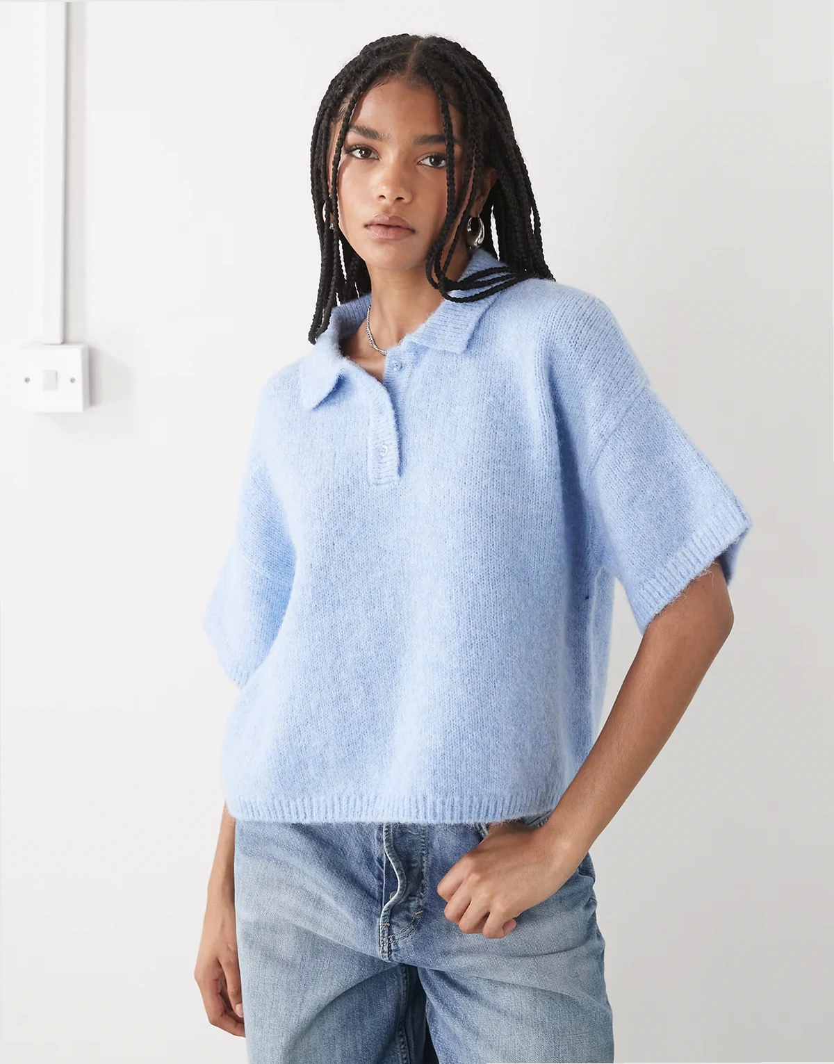 – Kurzärmliges Polohemd aus Strickstoff in Blau