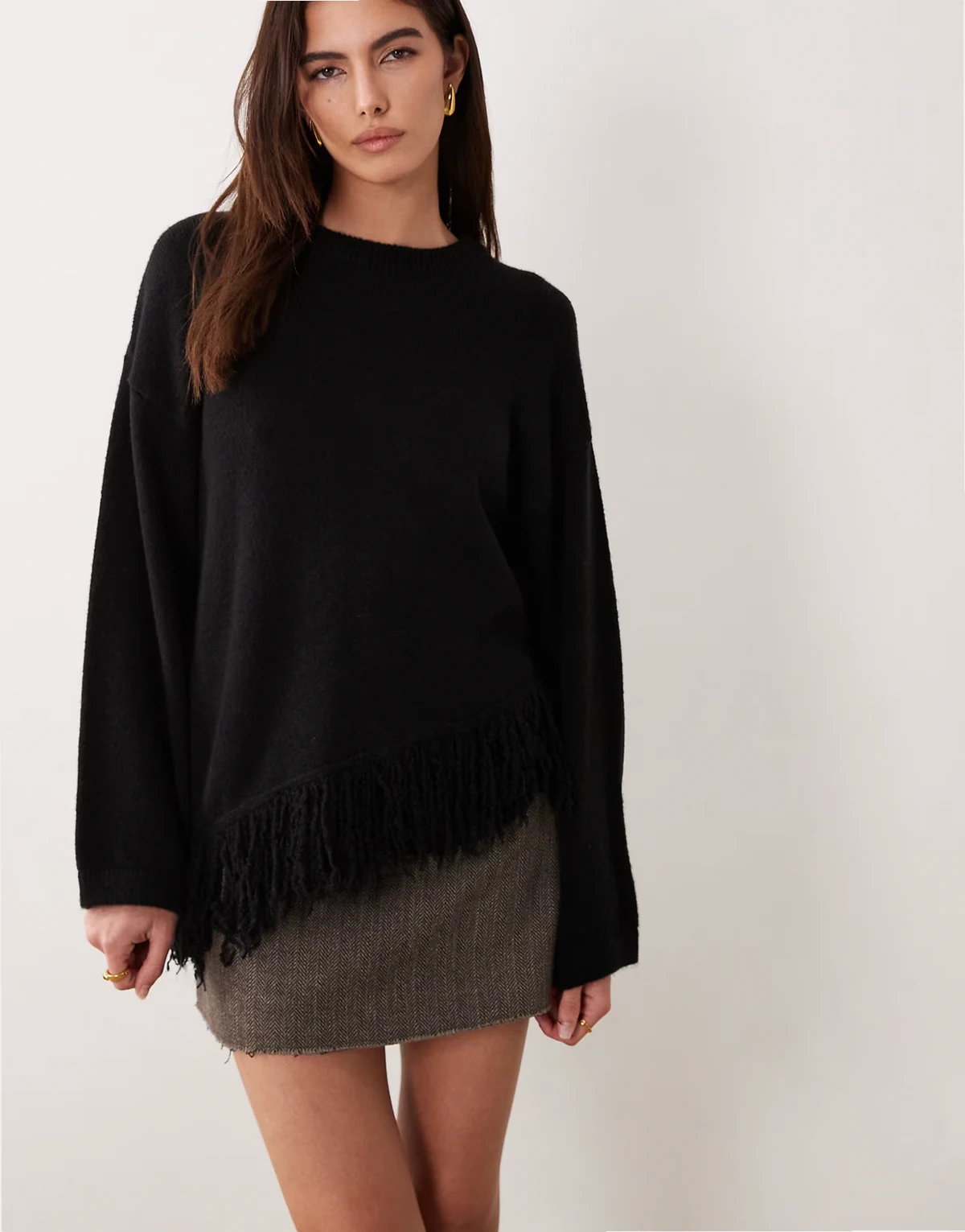 knit asymmetrical hem sweater with fringe in black