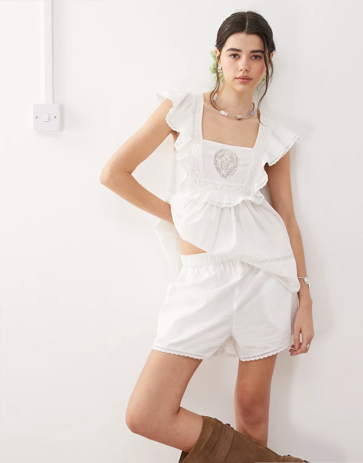 pull on shorts in white with embroidery edge - part of a set