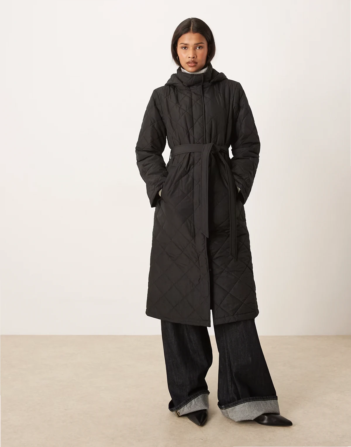 quilted longline coat with hood in black