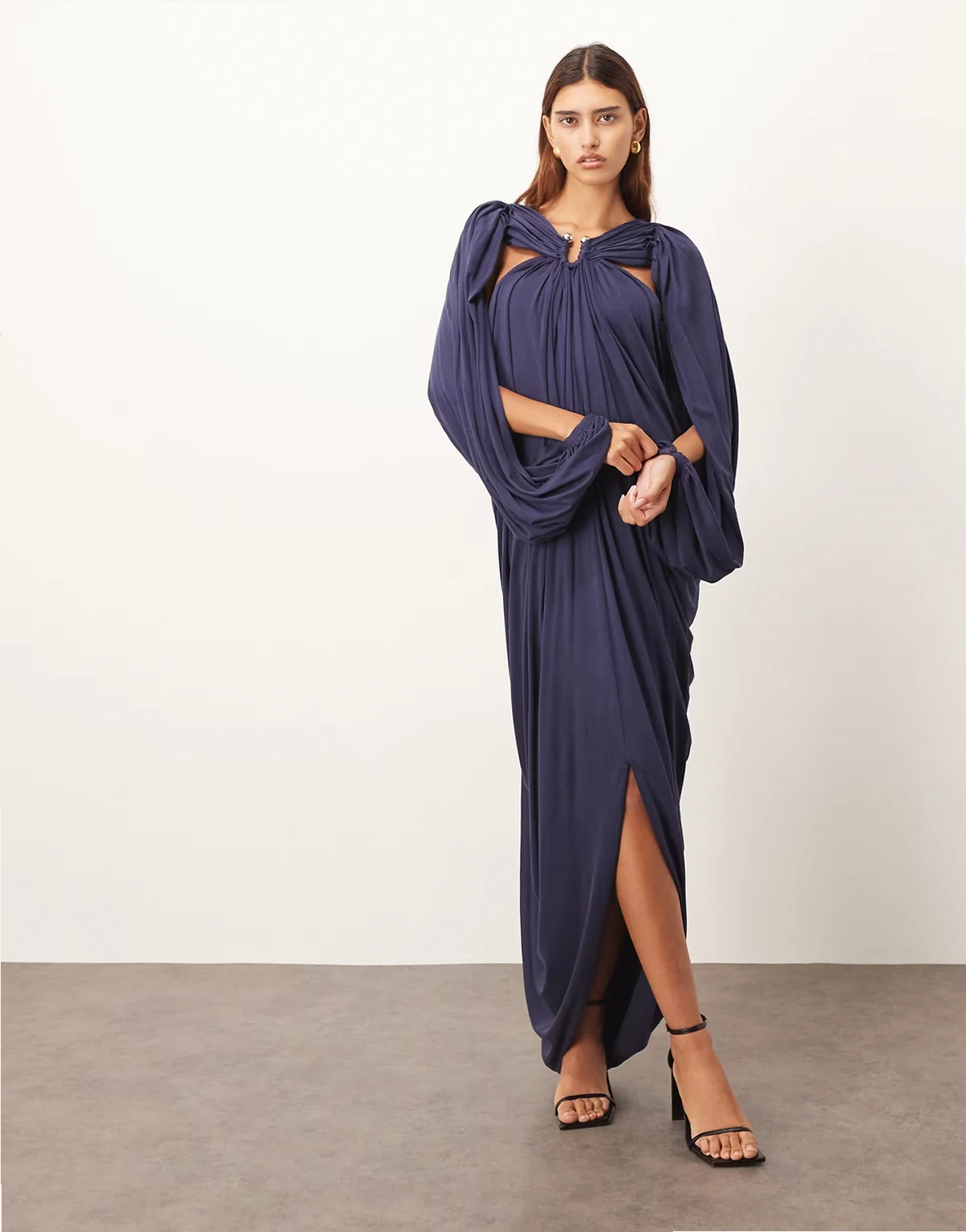 draped midi dress with balloon sleeves and hardware detail in navy