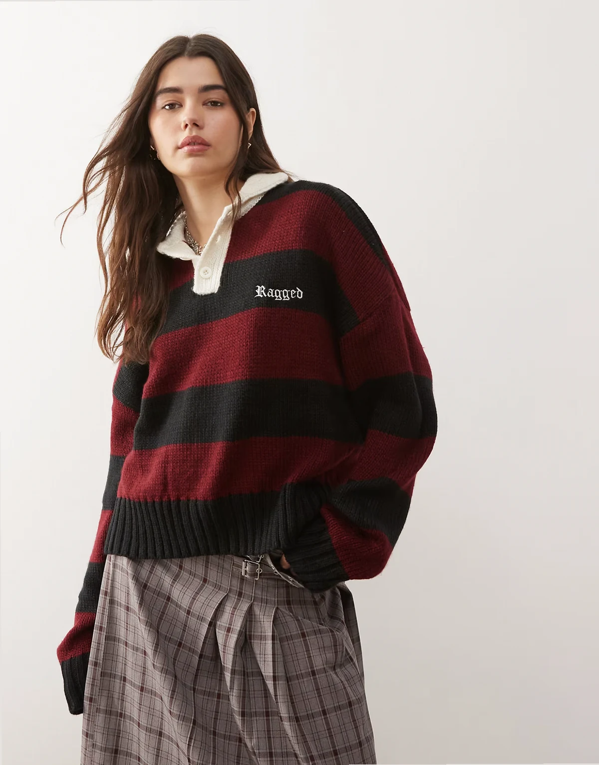 trophy polo knit sweater in black and red stripes