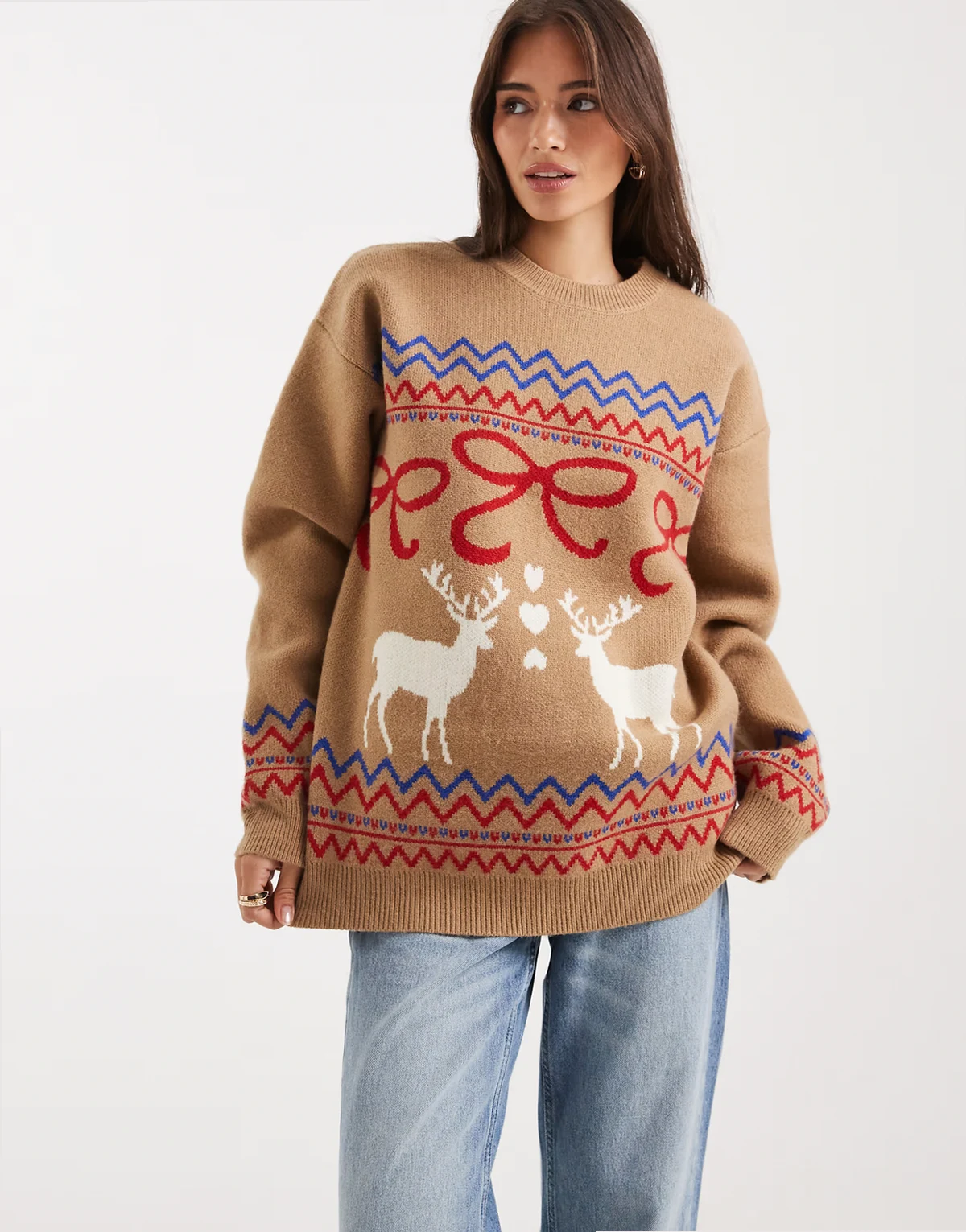 oversized reindeer bow sweater in camel