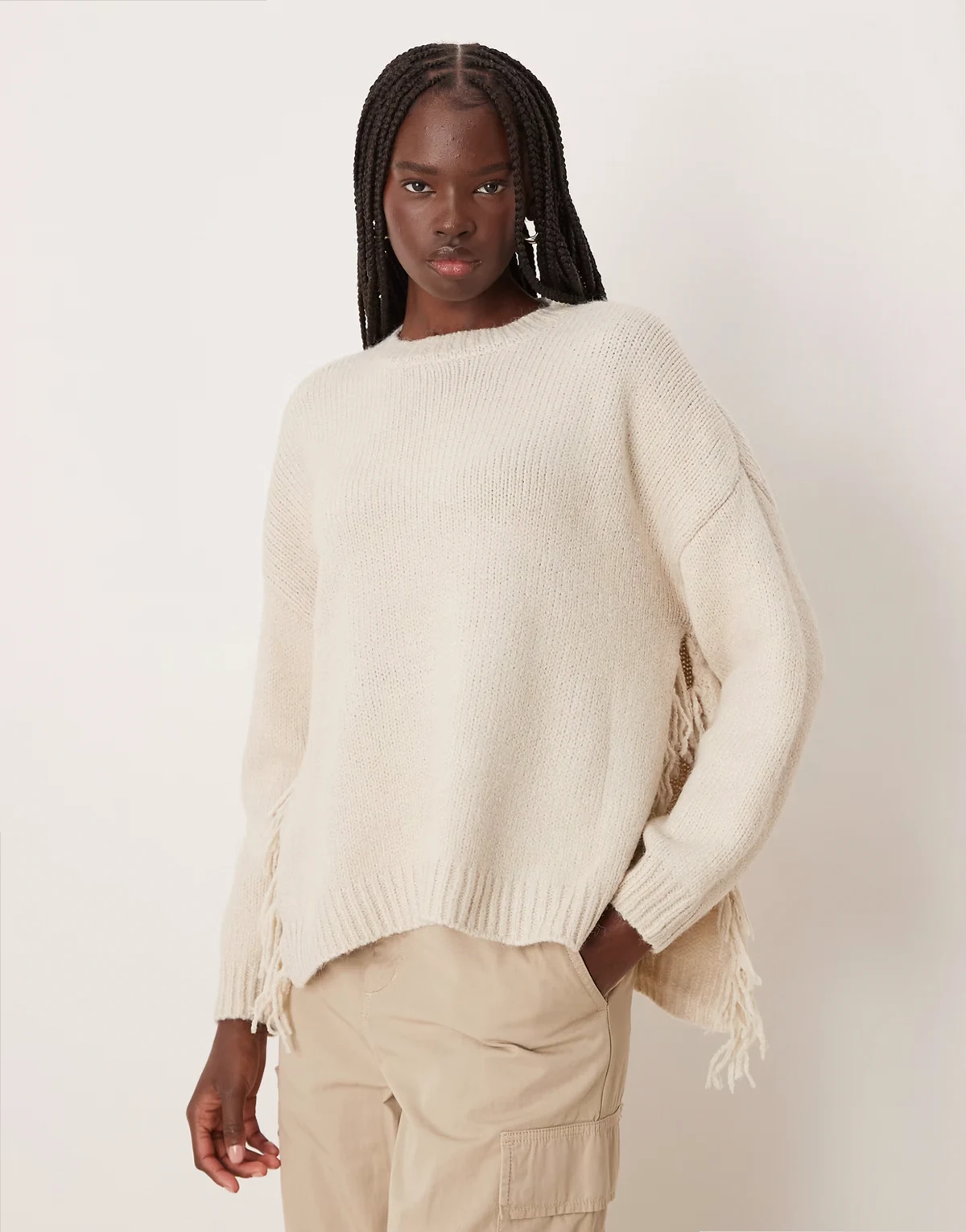 – Strickpullover in Creme mit Fransen