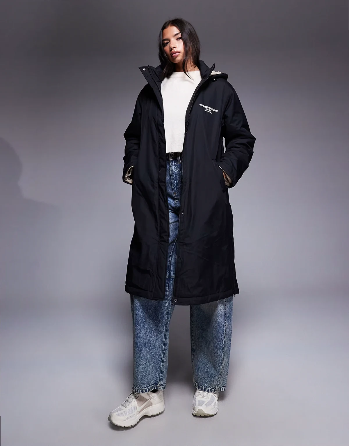 Weekend Collective longline coat with teddy lining and graphics in black and cream