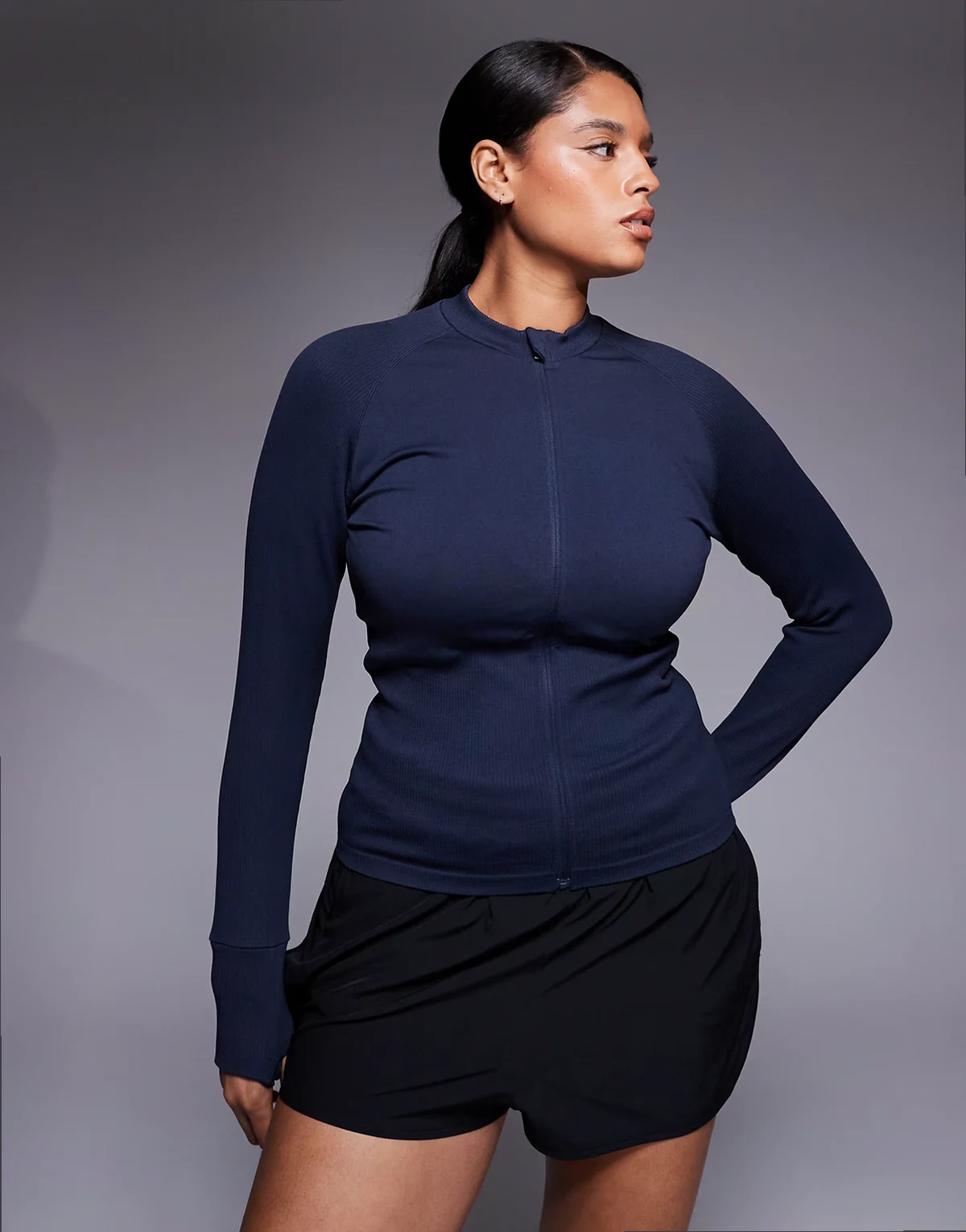 Curve seamless sculpting zip up long sleeve top in indigo