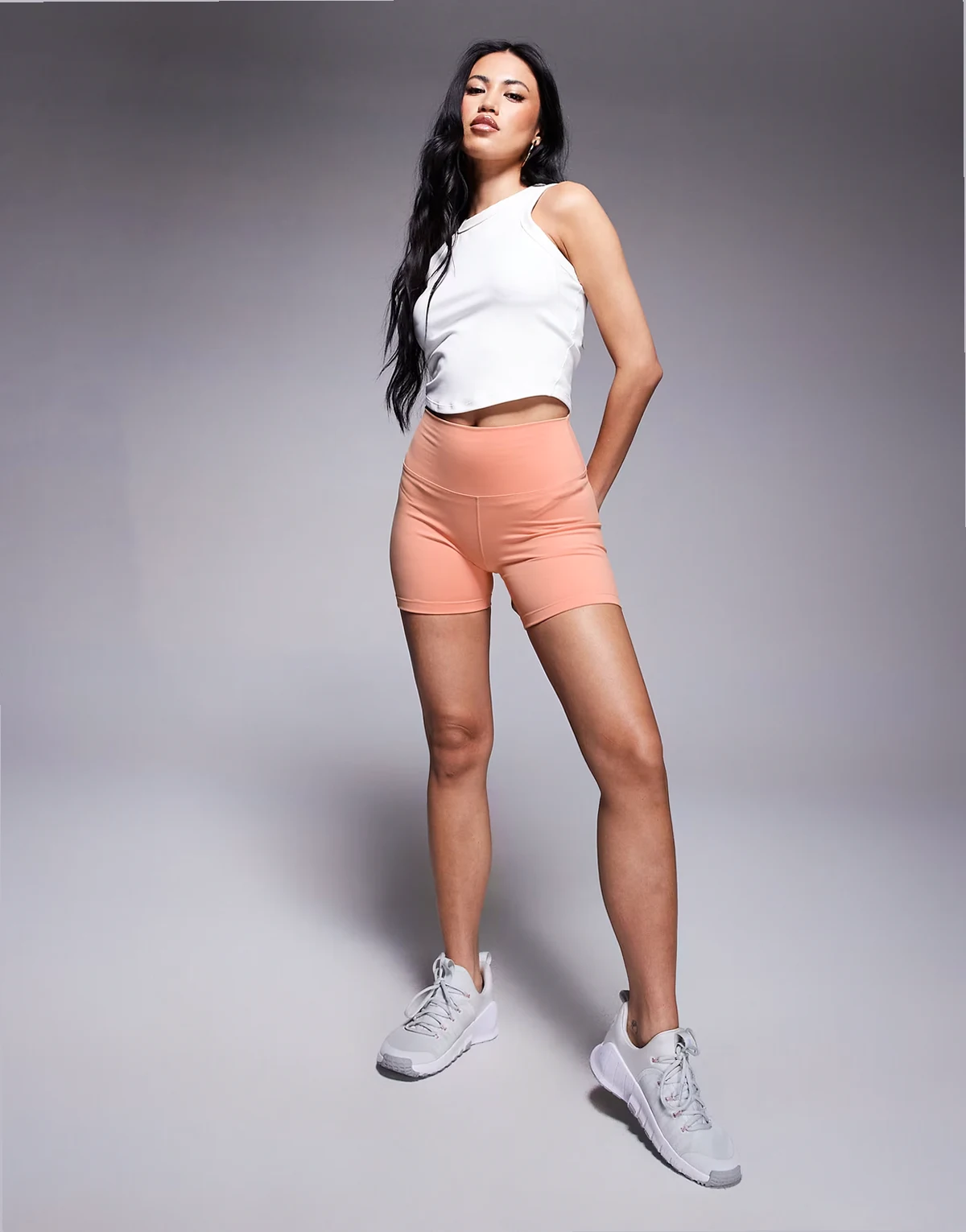 Nike One Training Dri-FIT high waist 5-inch shorts in orange