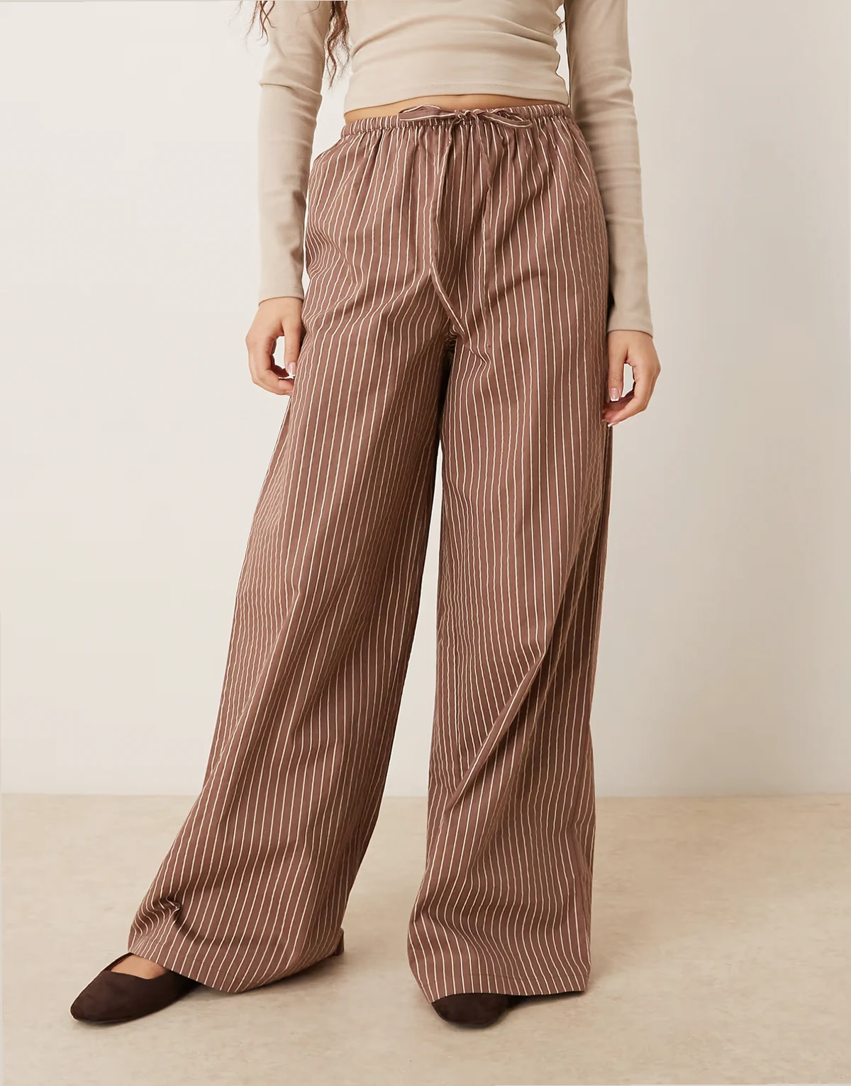 wide leg pinstripe pants in brown stripe