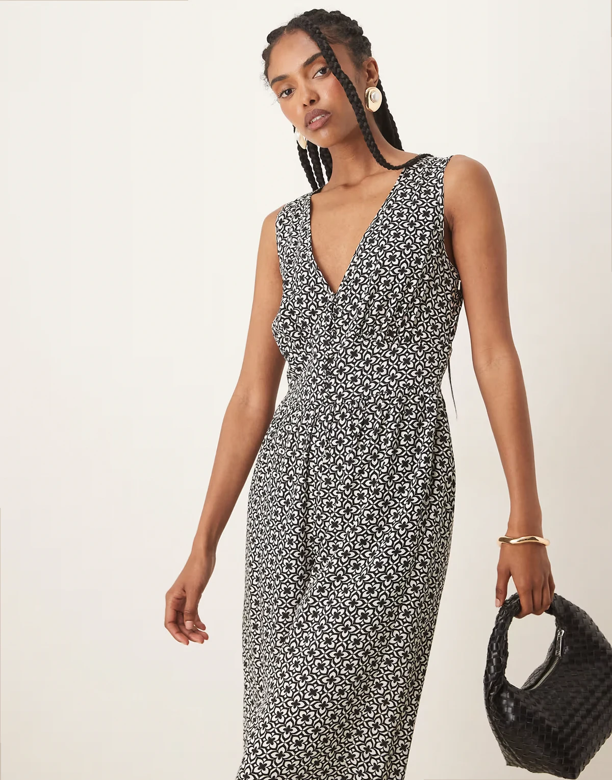 – Starlight – Ärmelloser Jumpsuit mit geometrischem Print in Schwarz-Weiß