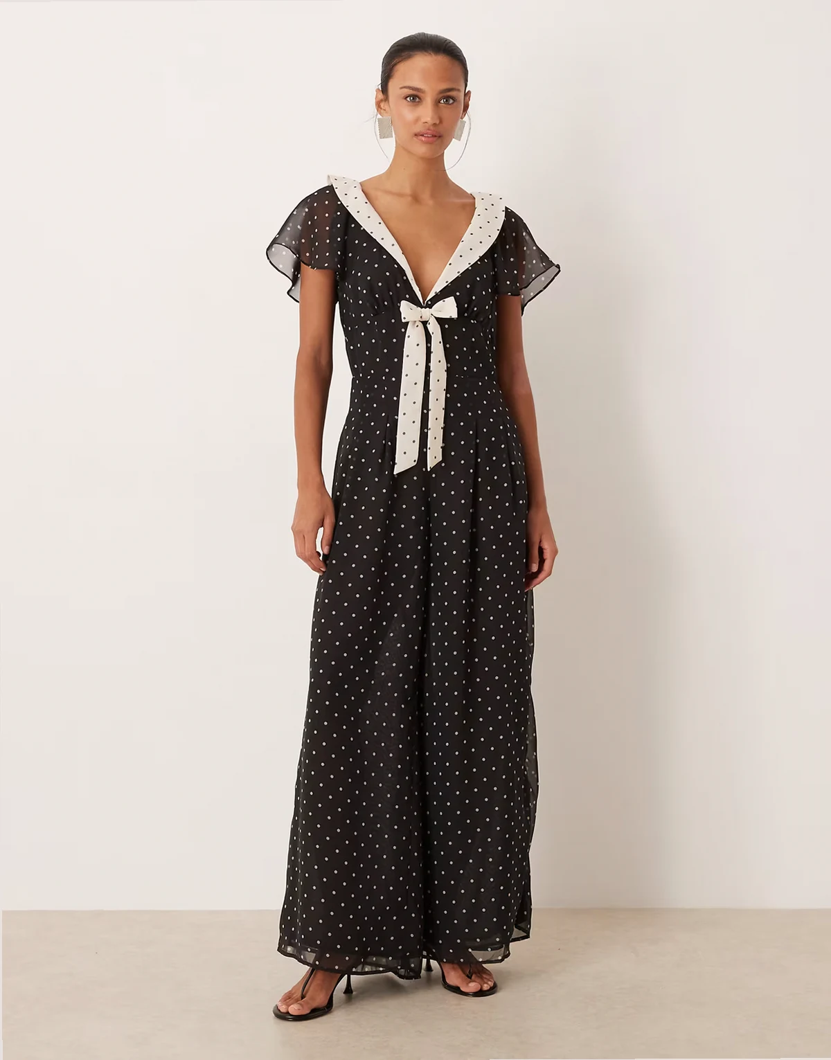 sailor collared jumpsuit in mono polka dot print