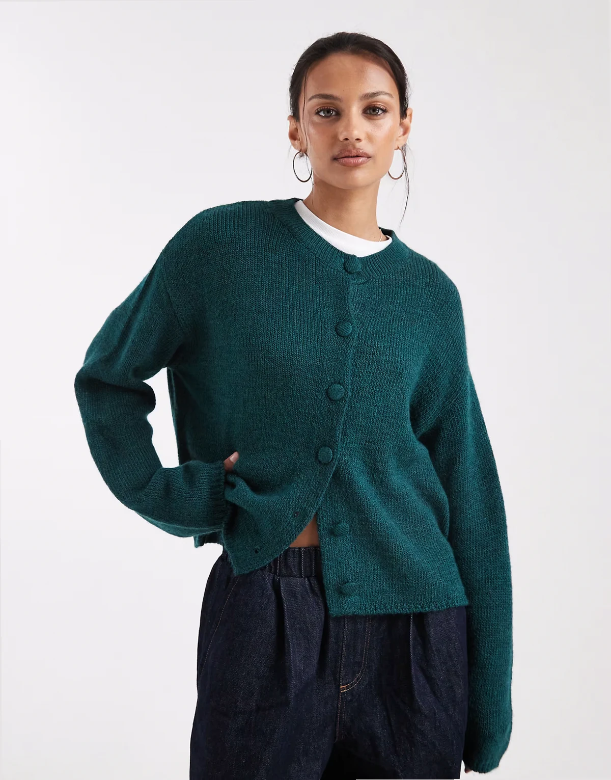 boxy cardigan with covered buttons in forest green