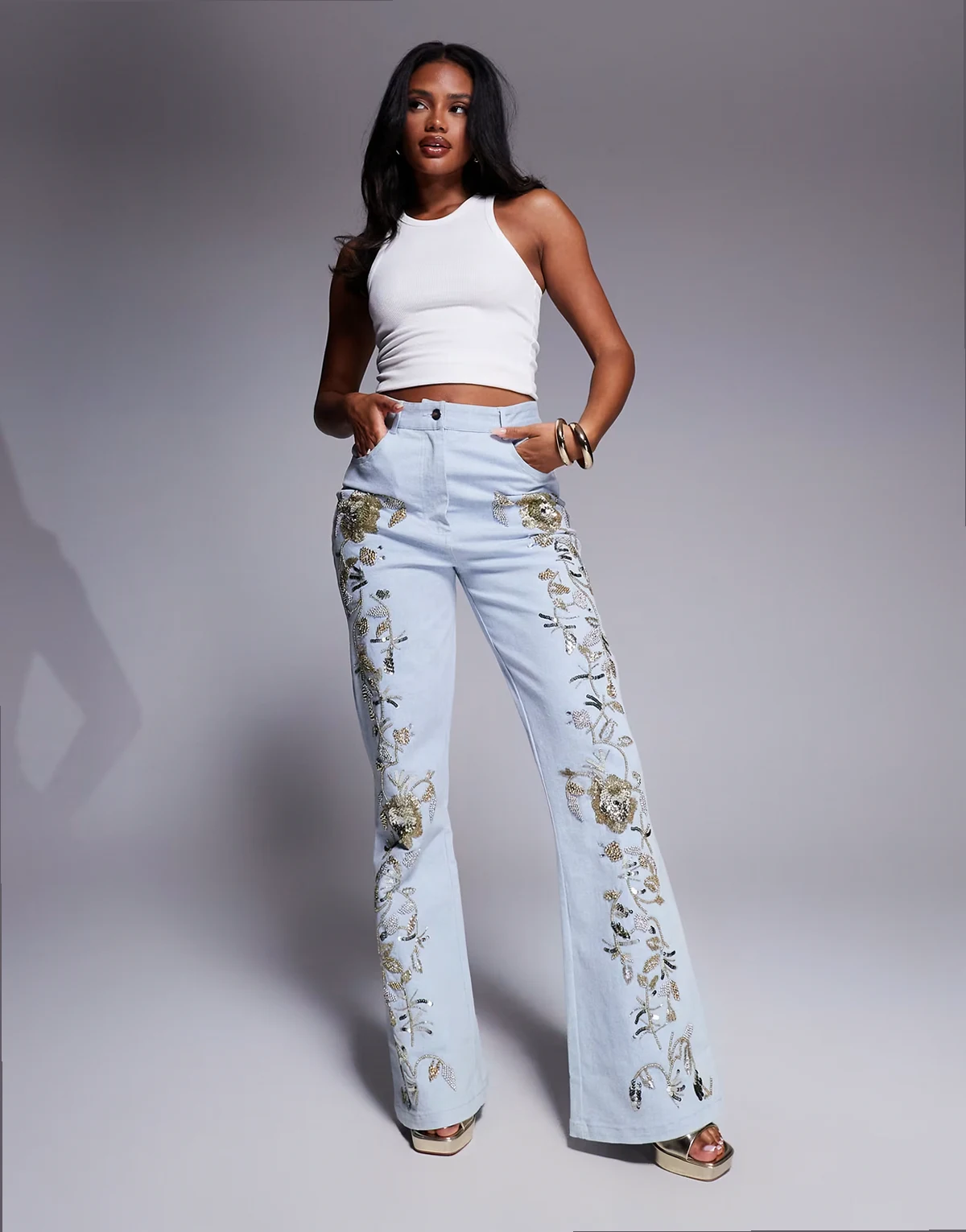 premium embellished gold denim jeans in mid wash blue