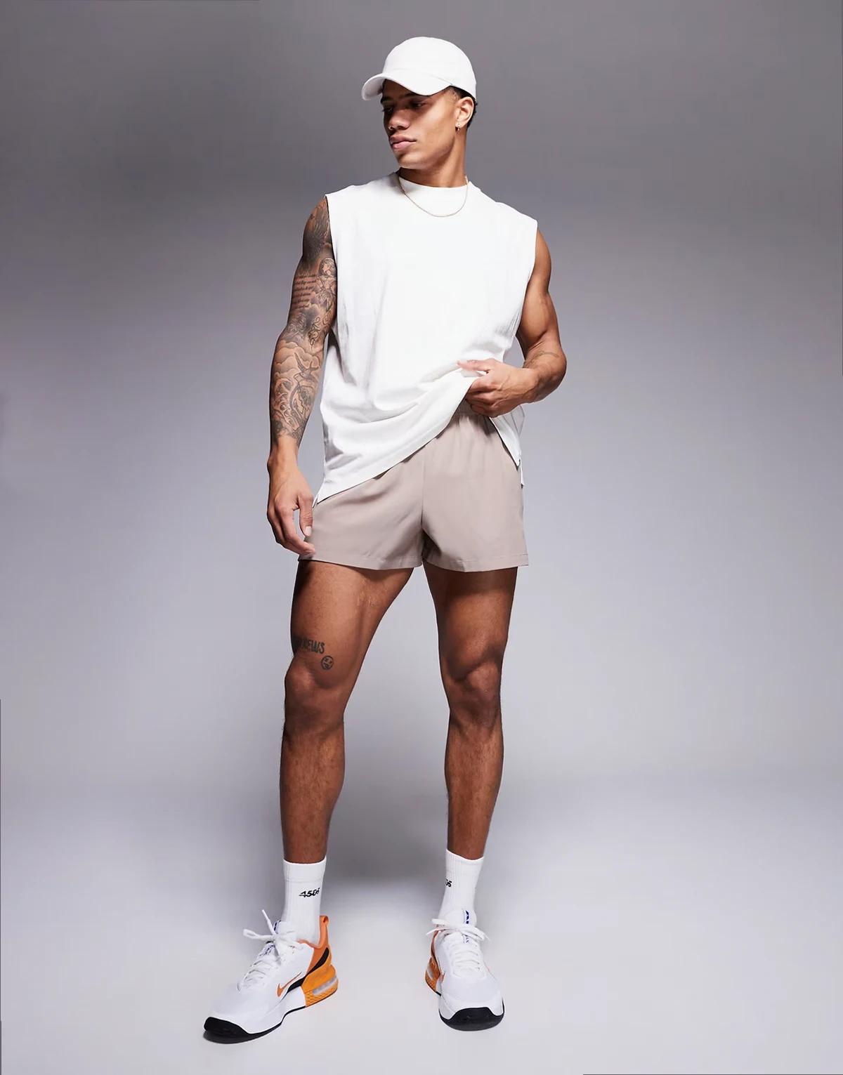 Icon cotton oversized pump training tank with quick dry finish in off white