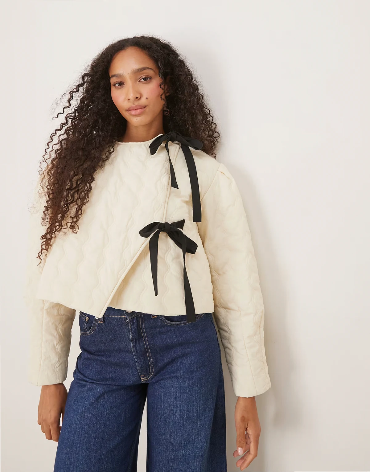 quilted cropped jacket with tie detailing in cream