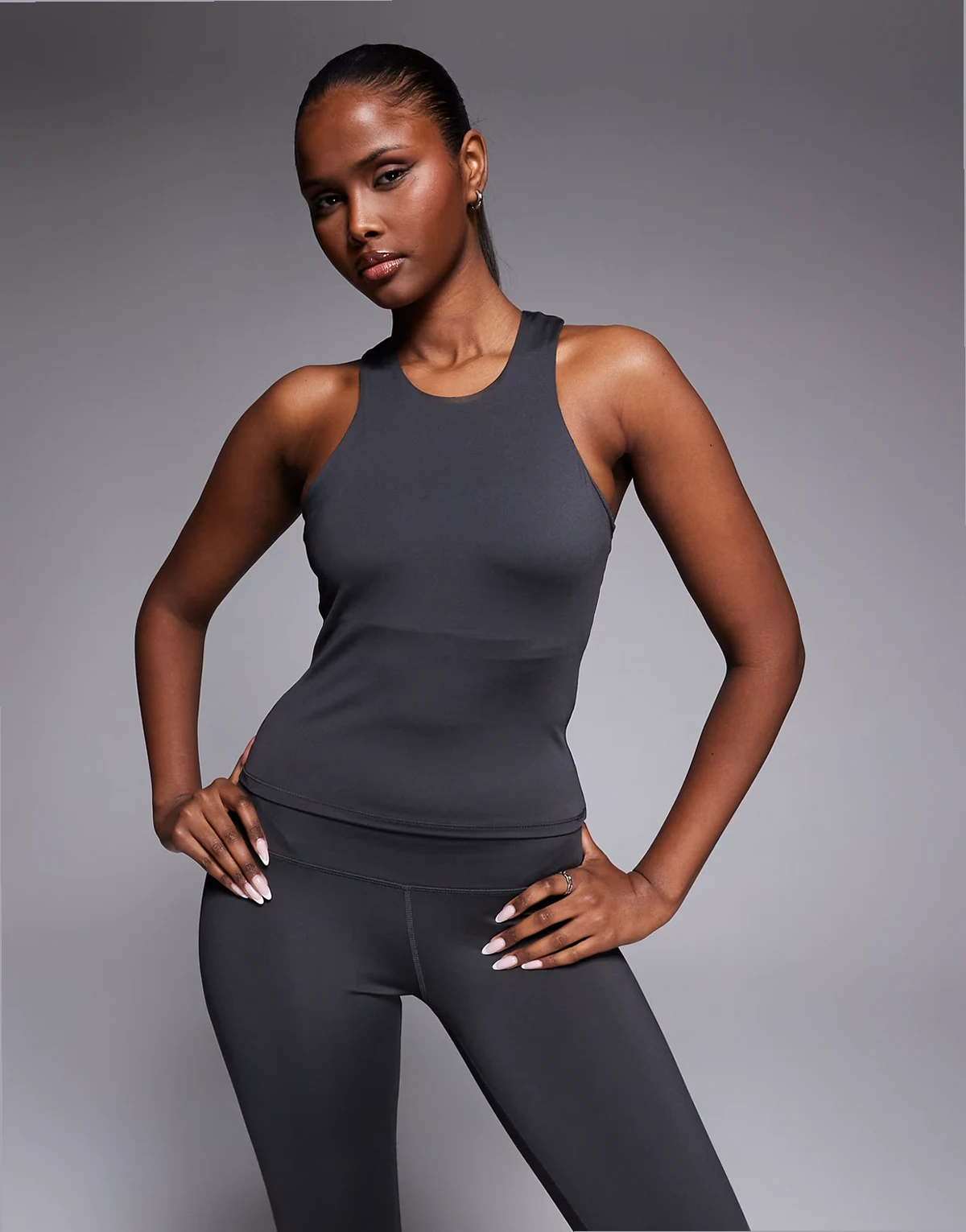Icon active racer back tank top with inner bra and removable padding in smoke gray