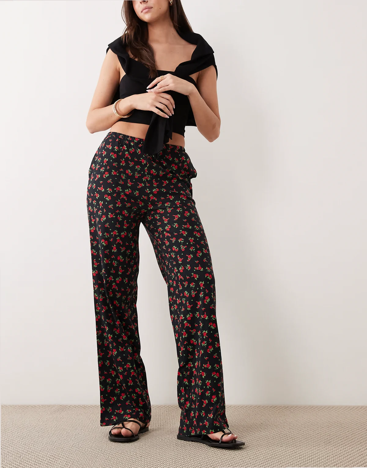 jersey pull on pants with drawstring waist in black with red floral print