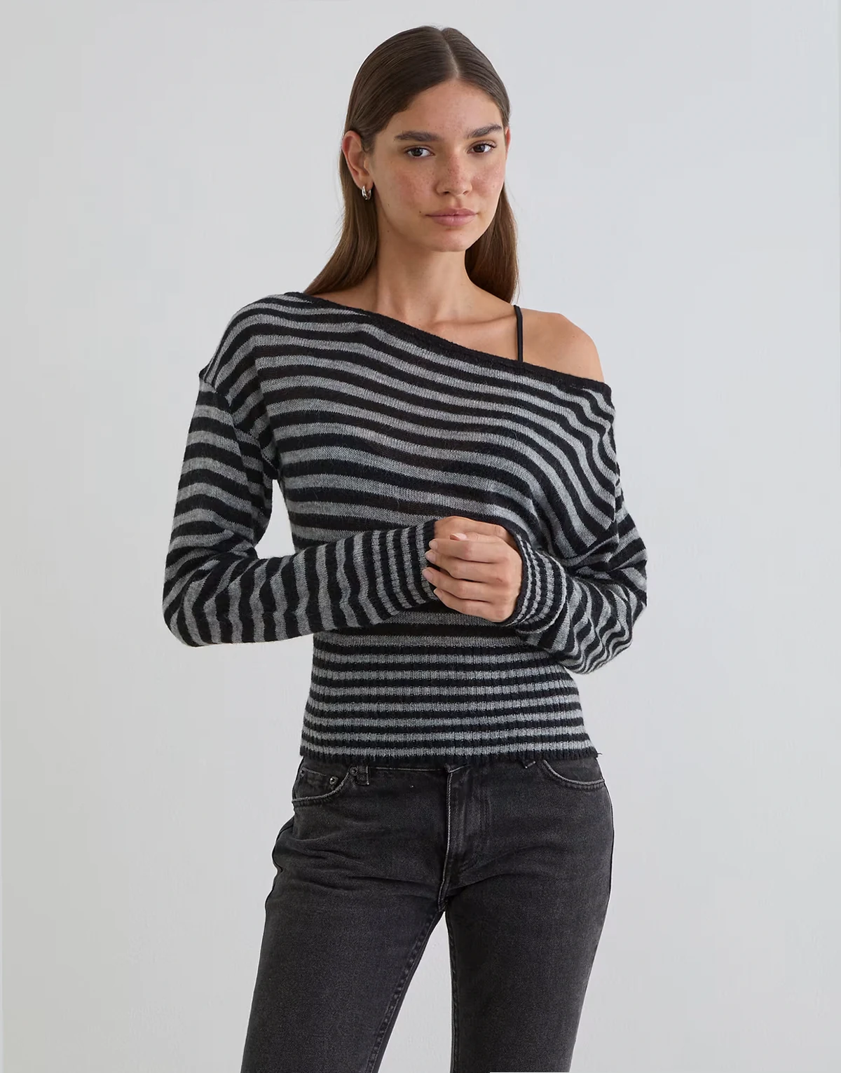 Suena asymmetric stripe knit sweater in black