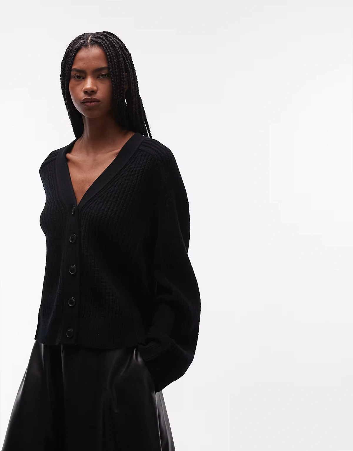 – Gerippte Strickjacke aus reiner Wolle in Schwarz