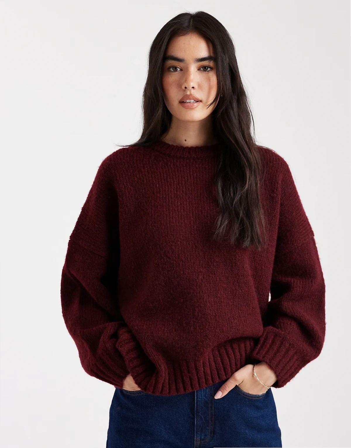oversized crew neck sweater with curved hem in plum