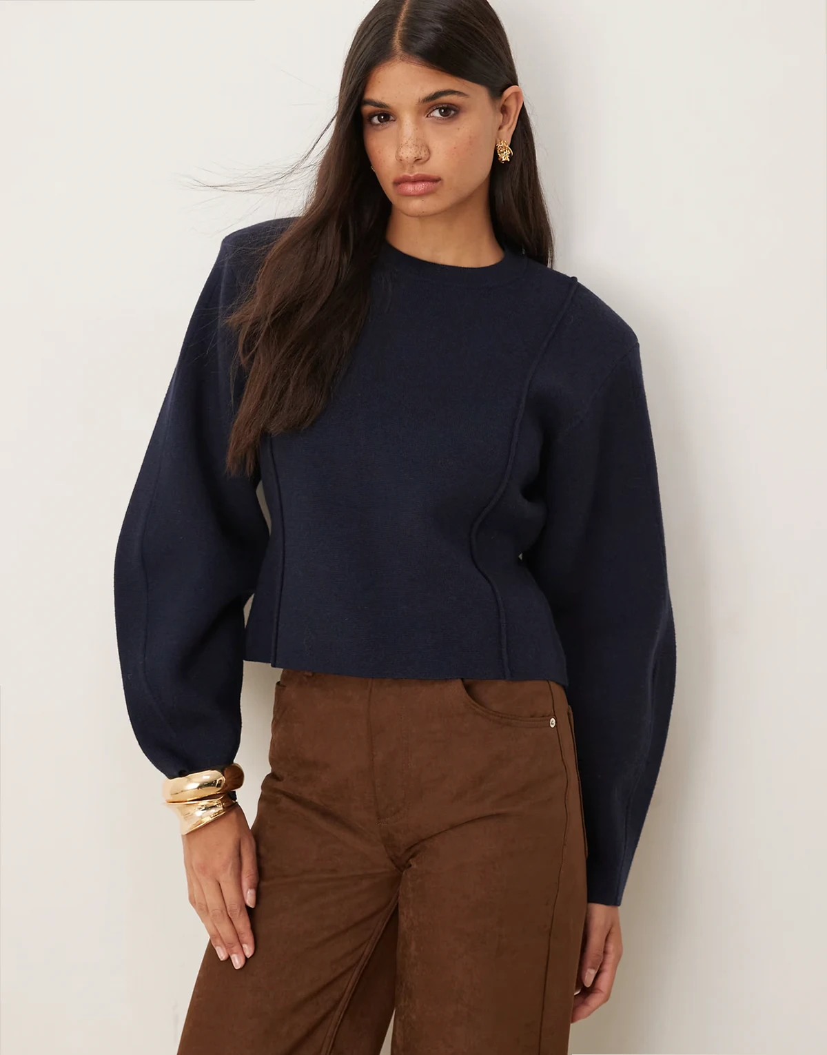 structured waisted sweater with shoulder pads in navy